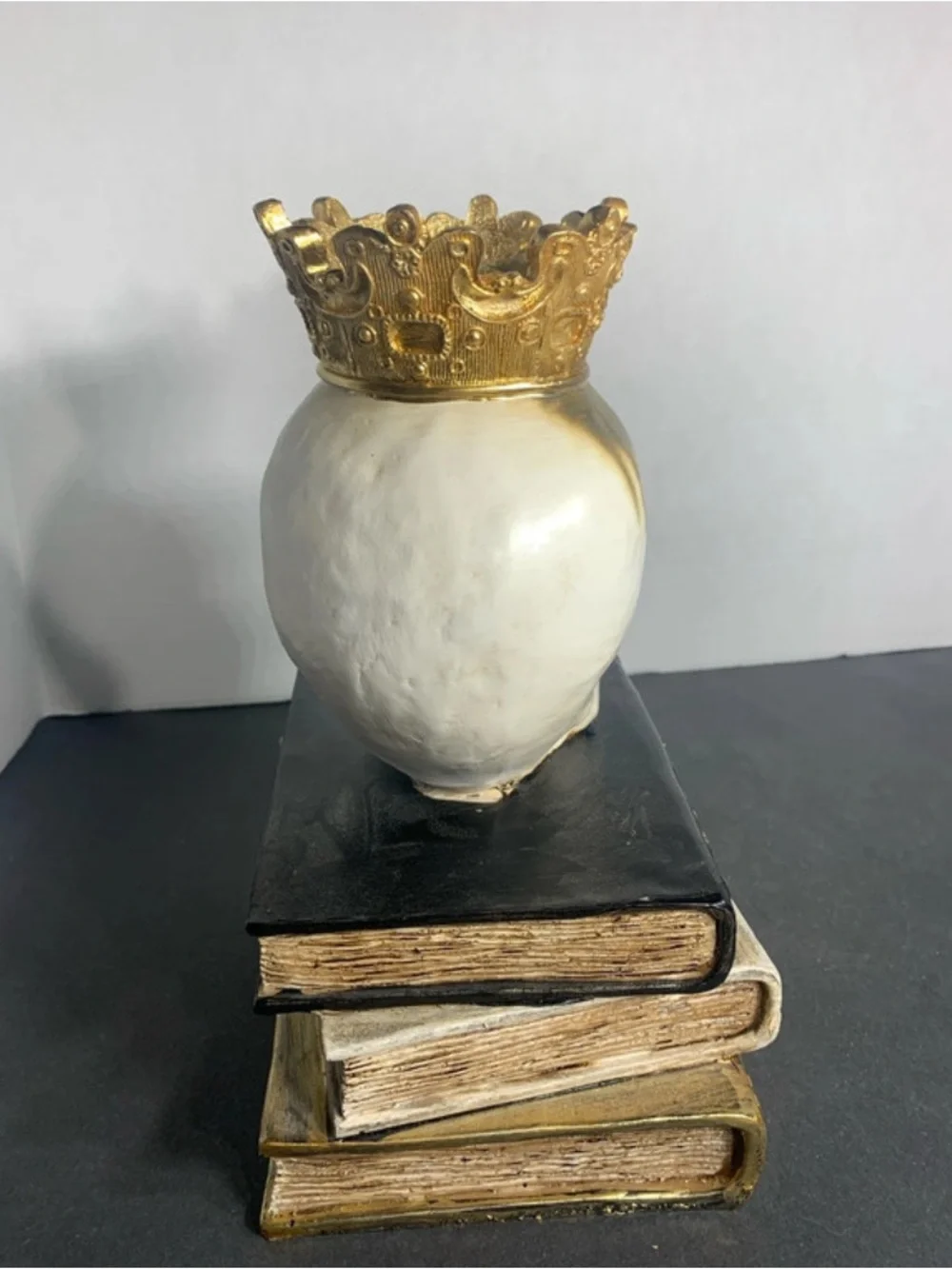 Decorative White and Gold Skull on Stacked Spell Books - Home Accent